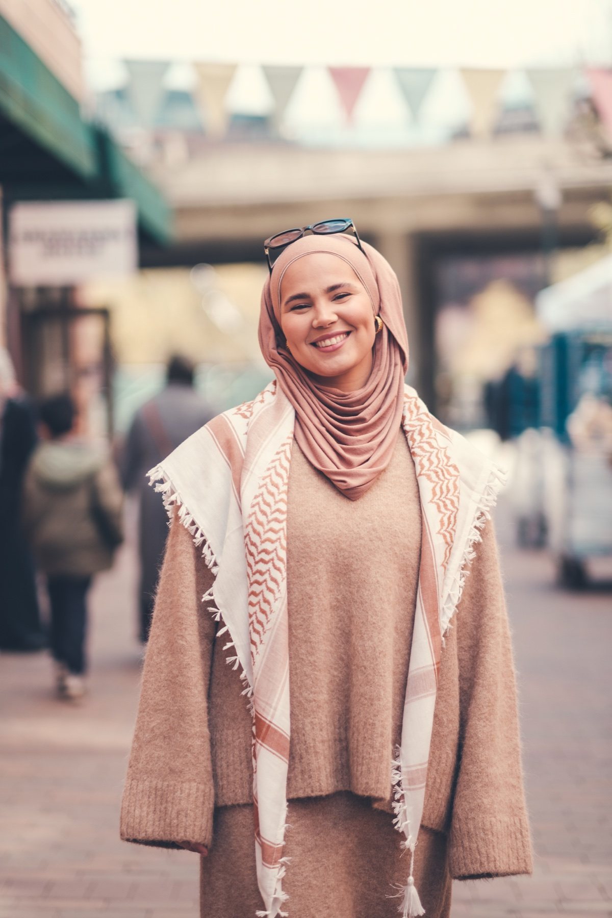 Iman Meskini smiling outdoors